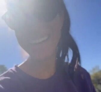 Meghan Markle wearing Princess Diana's iconic purple Northwestern sweatshirt